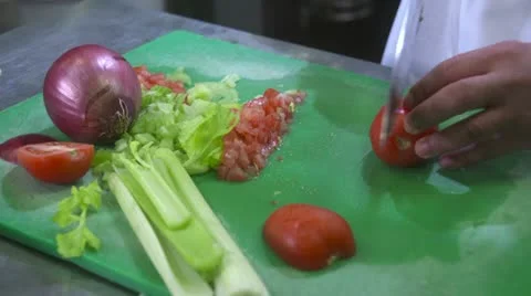 Chef Cutting Tomato - Close Up Stock Footage 10916155