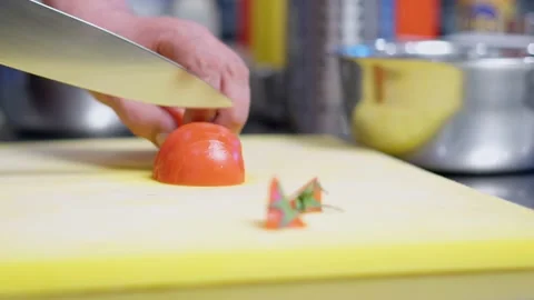 The chef cutting tomato. Stock Footage 154490689