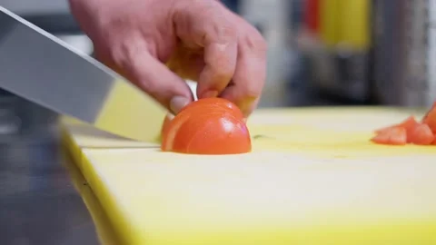 The chef cutting tomato using sharp knife. Stock Footage 152405376