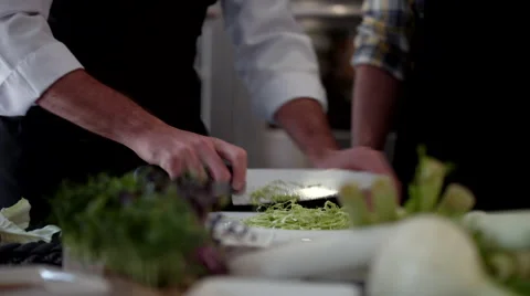 Chef cutting vegetable at kitchen. Stock Footage 64114911