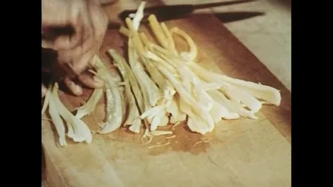 Chef cutting vegetable with knife on chopping board in commercial kitchen - 1954 Stock Footage 95196533