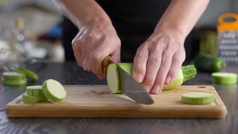 Chef cutting vegetables in kitchen Video stock 96478992
