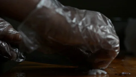  chef is cutting white raw squids Stock Footage 127894846