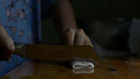 Chef is cutting white raw squids Stock Footage 127894847