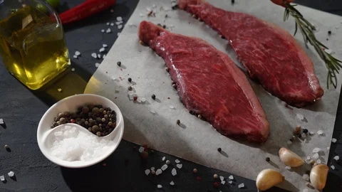 Chef decorated the dish with steaks with a sprig of rosemary Video stock 115831358