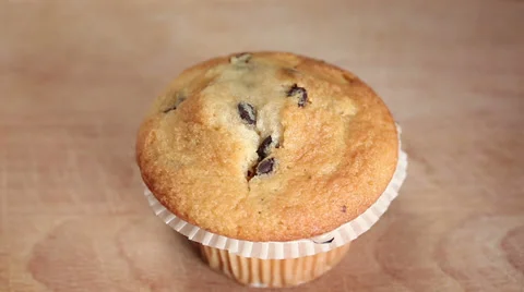 Chef decorates cupcake with cream and sprinkles Stock Footage 34776992