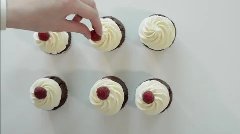 Chef decorates dessert cake with strawberry Stock Footage 61832051