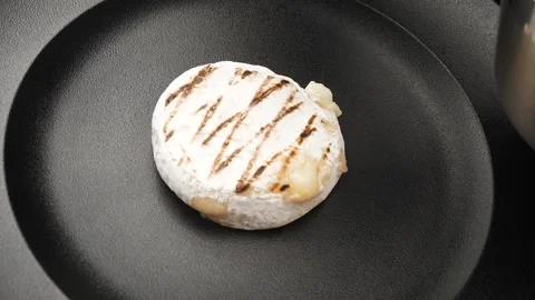 Chef decorates the dessert with jam, grilled cheese camembert Stock Footage 160277915