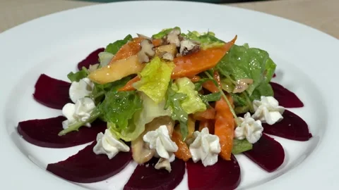 The chef decorates the dish with cream Stock Footage 306803621