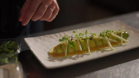 Chef Decorates Finished Dish On Plate With Plants. Stock Footage 275530571