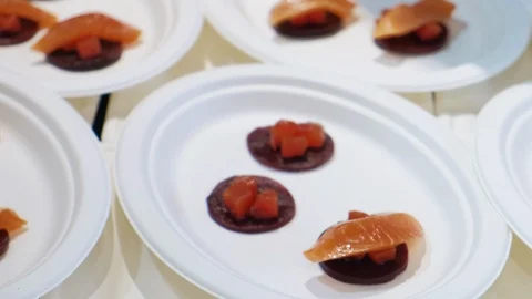 Chef decorates fish in a restaurant 스톡 동영상 121749597