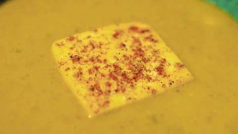 Chef decorates a vegetable soup with parsley vegetarian dish Stock Footage 113110122