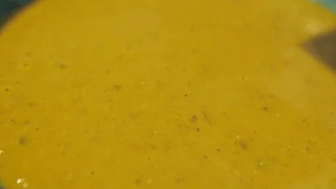 Chef decorates the vegetable soup with a piece of tofu. vegetarian dish Stock Footage 113110023