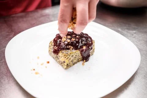 Chef decorating a dessert Stock Photos