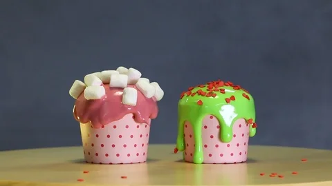 Chef is decorating festive cupcakes Stock Footage 90333674