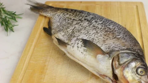 Chef Decorating Fish with Rosemary - 1 Stock Footage 83386972