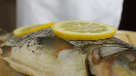 Chef Decorating Fish with Rosemary - 2 Video stock 83386662