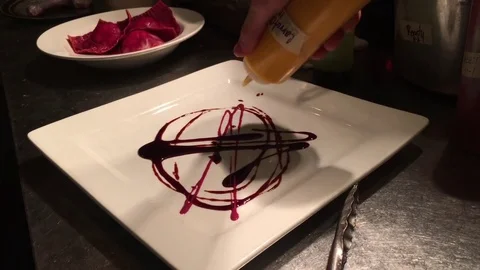 Chef Decorating Plate With Colorful Sauces Hi Res 82213946