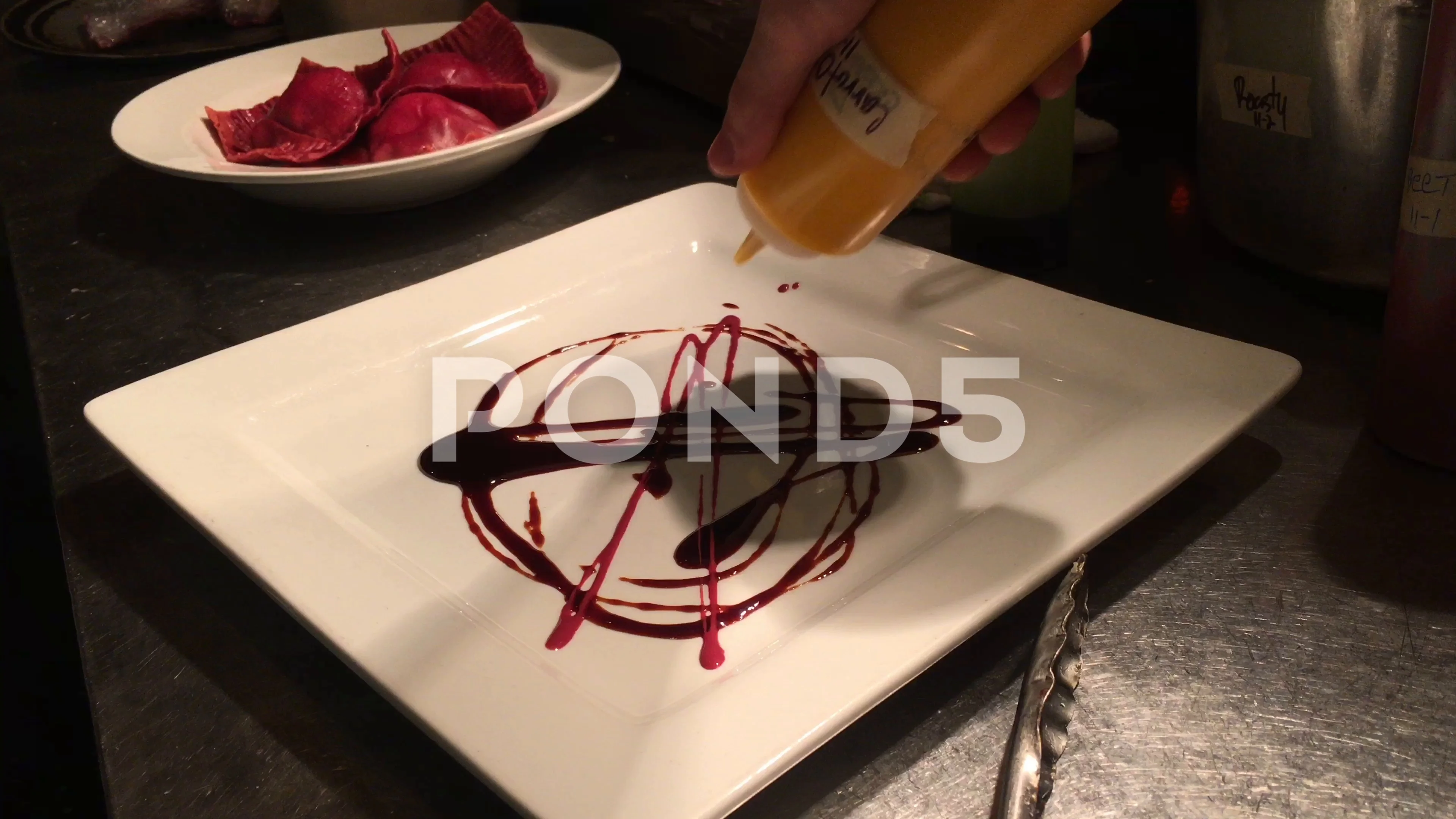 Chef Decorating Plate With Colorful Sauces Hi Res 82213946