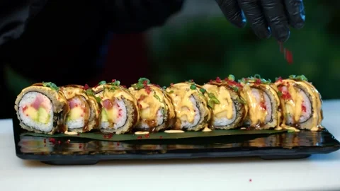 Chef decorating rolls, Traditional healthy food. slow motion. Stock Footage 239100730