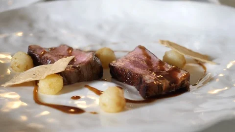 Chef decoration of meat dish Stock Footage 102917855