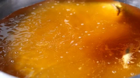 Chef Deep Frying Small Fish in Hot Oil Stock Footage 341909150