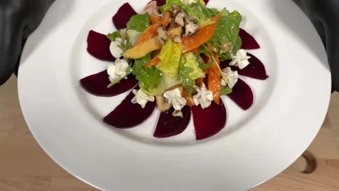 The chef demonstrates the dish on camera Stock Footage 306803648