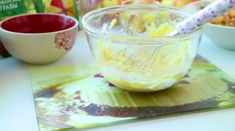 Chef demonstrates the preparation of the batter for the fried chicken Stock Footage 68895578