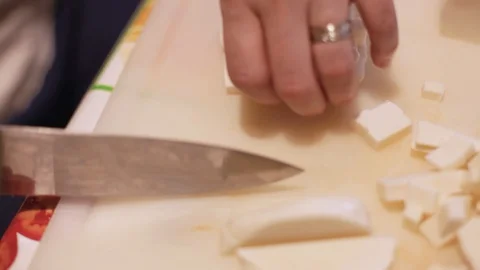 Chef dices mozzarella Stock Footage 127892887