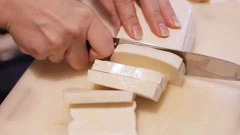 Chef dices mozzarella Stock Footage 127892907