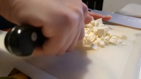 Chef dices mozzarella Stock Footage 127894654