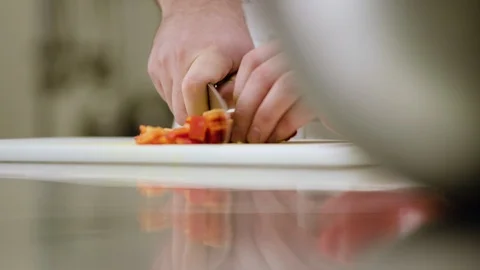 A chef dices red bell pepper slow motion Video stock 91052964