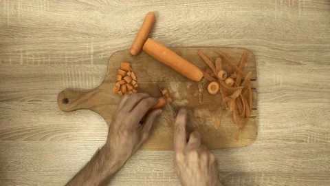 Chef dicing carrot with knife Stock Footage 122280490