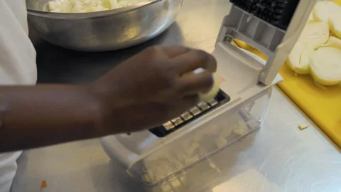 Chef Dicing Fresh Onions with Manual Chopper Stock Footage 339244343