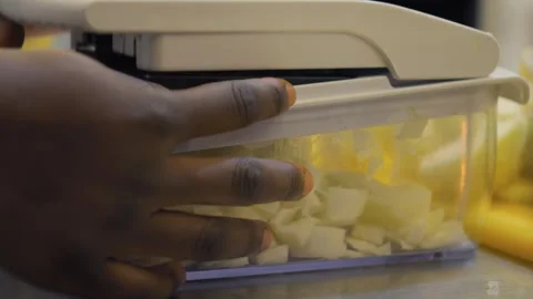Chef Dicing Onions with Manual Vegetable Chopper Stock Footage 339243147