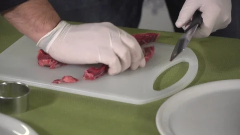 Chef dicing steak  Stock Footage 101634849