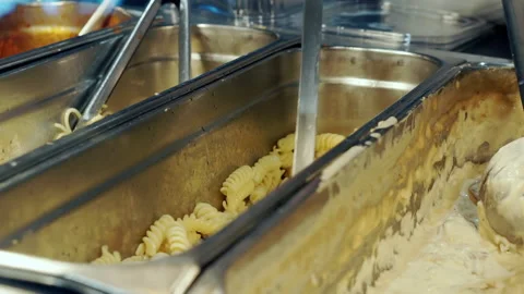 The chef in the dining room puts the pasta on a plate. Stock Footage 152857873