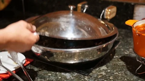 Chef dishes up pulled pork onto white dish in slow motion from buffet line Stock-Footage 86442095