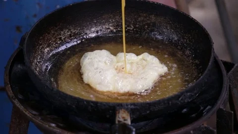 Chef doing omelette Stock Footage 81672980