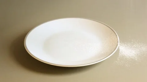 Chef draws a face with a smile on the table, sprinkle with flour. Video stock 70075470