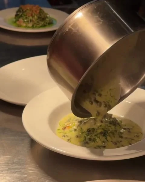 Chef Drizzling Jus on Sliced Grilled Steak Video stock 340868852