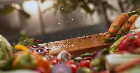 Chef dropping lettuce leaf on board Stock Footage 311833610