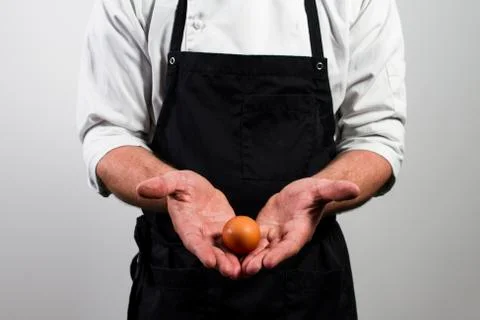 Chef with egg Stock Photos