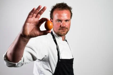 Chef with egg Stock Photos