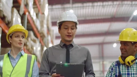 Chef Engineer Walking with Two Employees Stock Footage 76951476