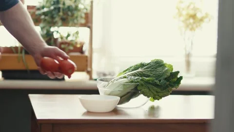 Chef Entering Bright Kitchen to Prepare Fresh Organic Vegetable Salad Stock Footage 347134632