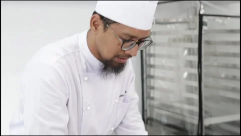 Chef explain something about baking Stock Footage 296045443