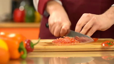 Chef fast chopping red tomato. Video stock 146870246