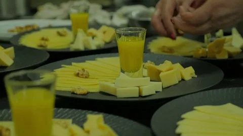 Chef finalizing a cheese in a kitchen. Close up hands no faces. Slow motion Stock Footage 74405308