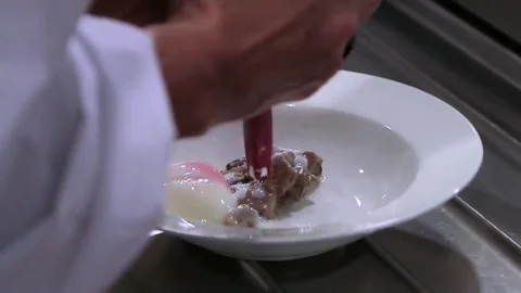 The chef is finalizing his preparation Stock Footage 69240342